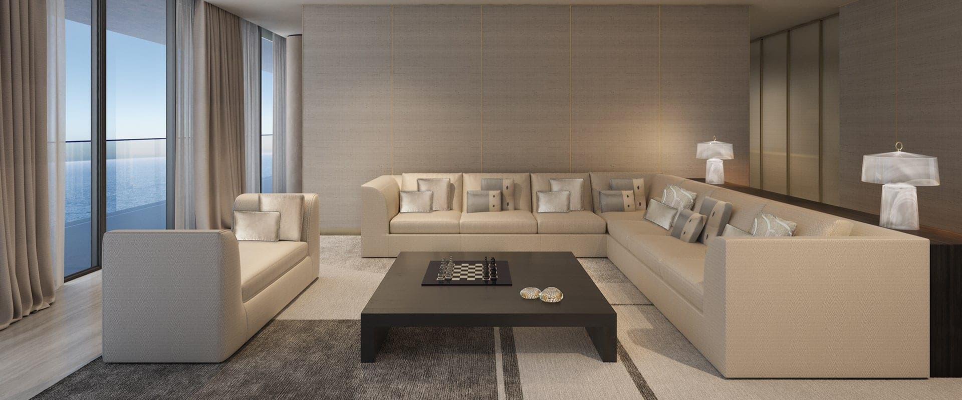 Render of a living room at Armani Beach Residences at Palm Jumeirah, with a corner sofa and floor-to-ceiling windows onto the sea