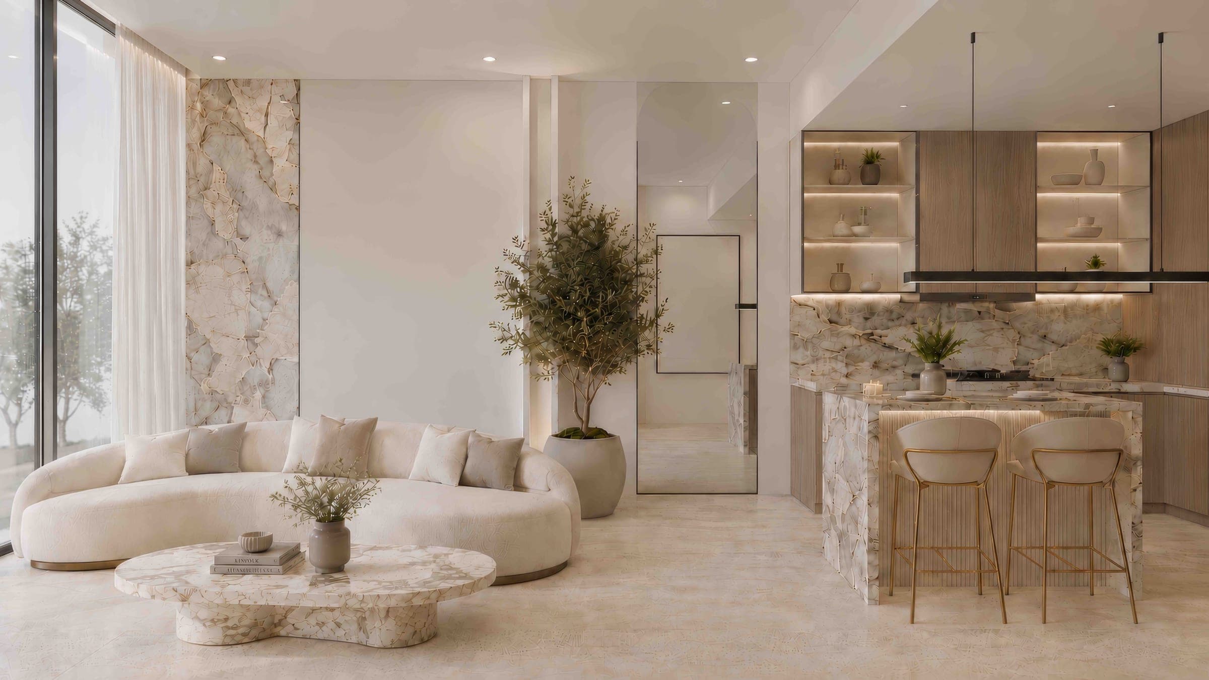 Render of a one-bedroom apartment living area at Beverly Crown in Jumeirah Village Circle, with a curved sofa, a marble kitchen counter and an olive tree