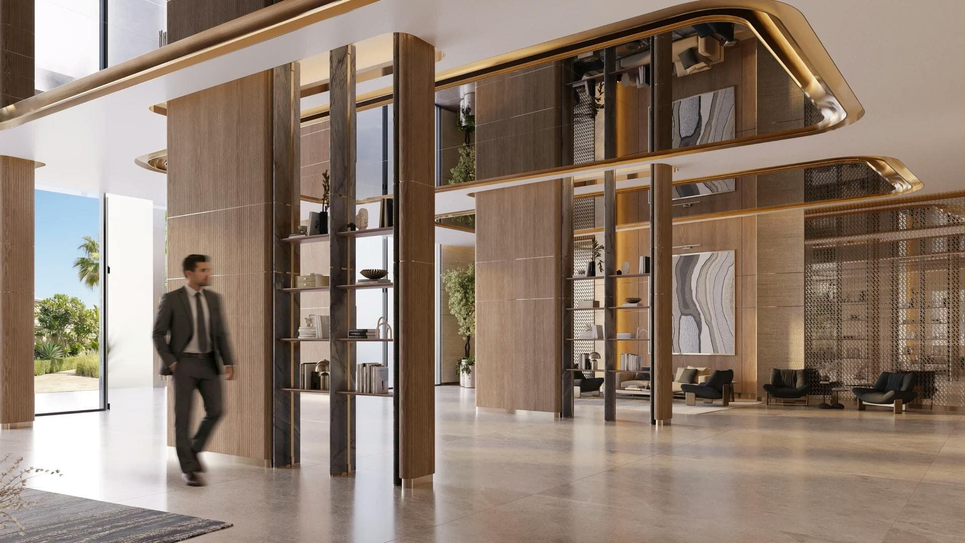 Render of the residents' lobby at Binghatti Wraith, with timber screens and a seating area
