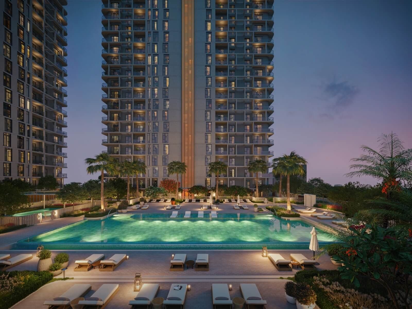 Render of the podium pool at Cello in Jumeirah Village Circle at dusk, lit water and loungers below the towers
