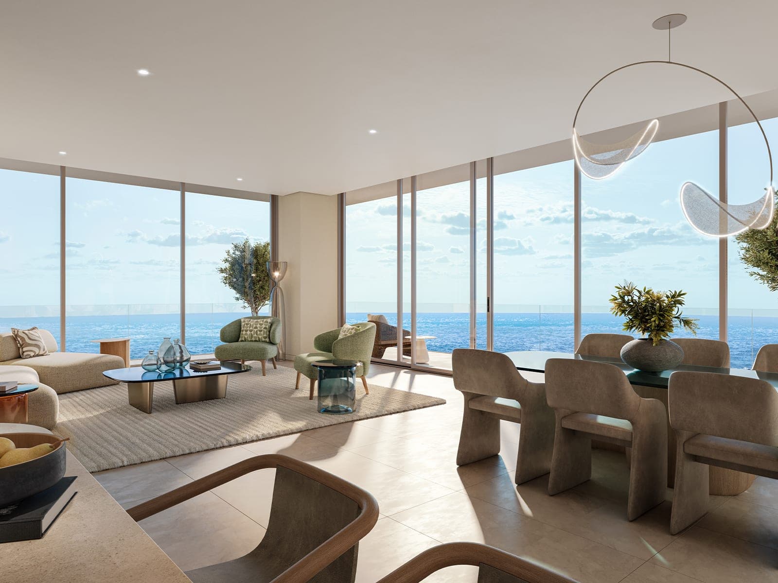 Render of a furnished living and dining room in a Chelsea Residences apartment, with full-height glazing onto a sea view