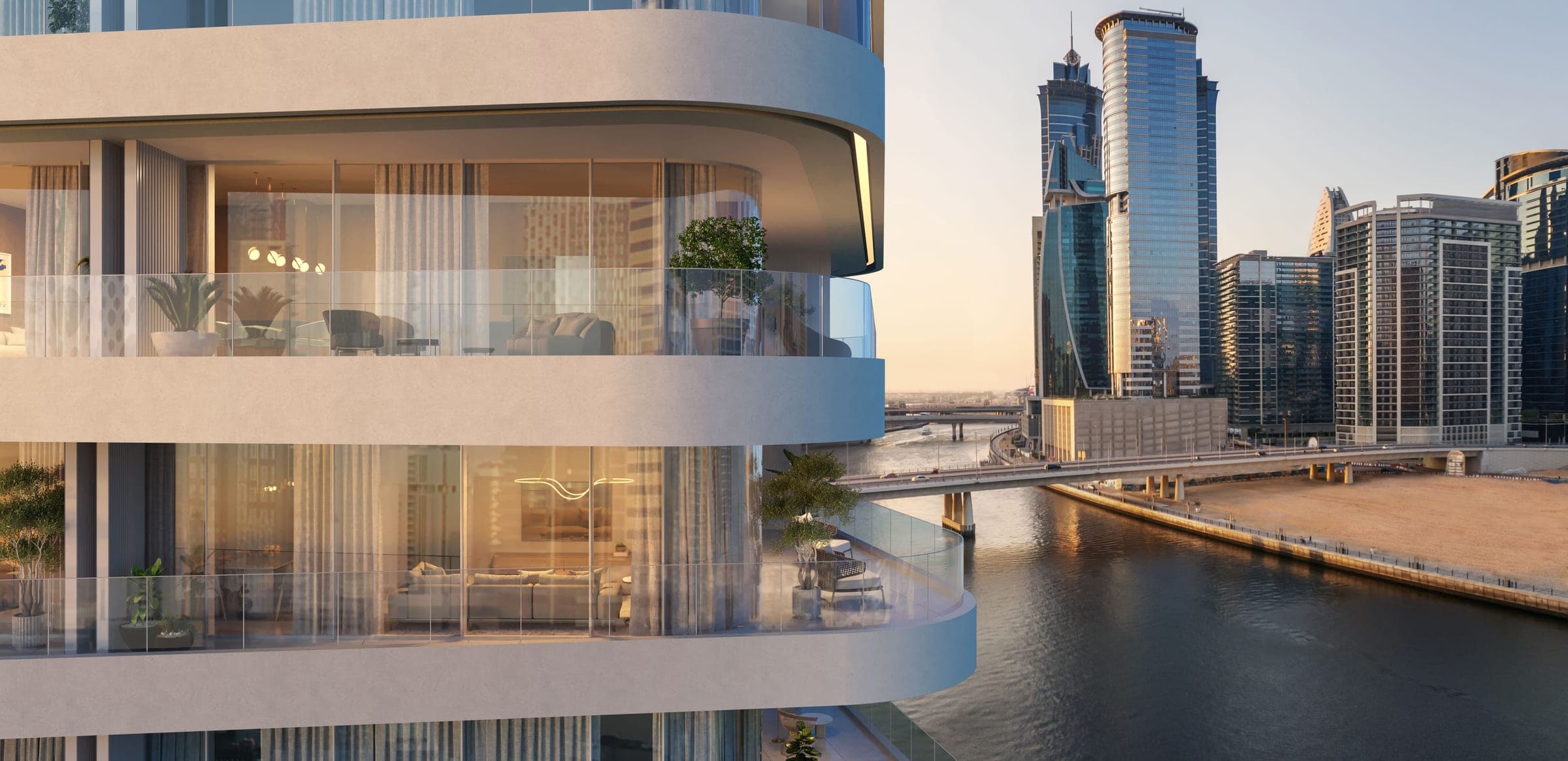 Render of curved glass balconies at DG1 at sunset, overlooking the Business Bay canal and a bridge