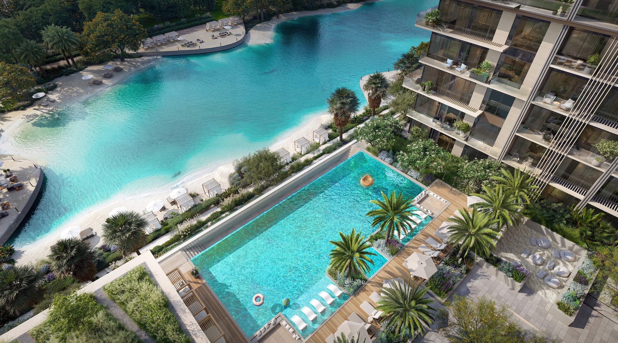 Render of the pool deck at Everly Place, seen from above beside the lagoon