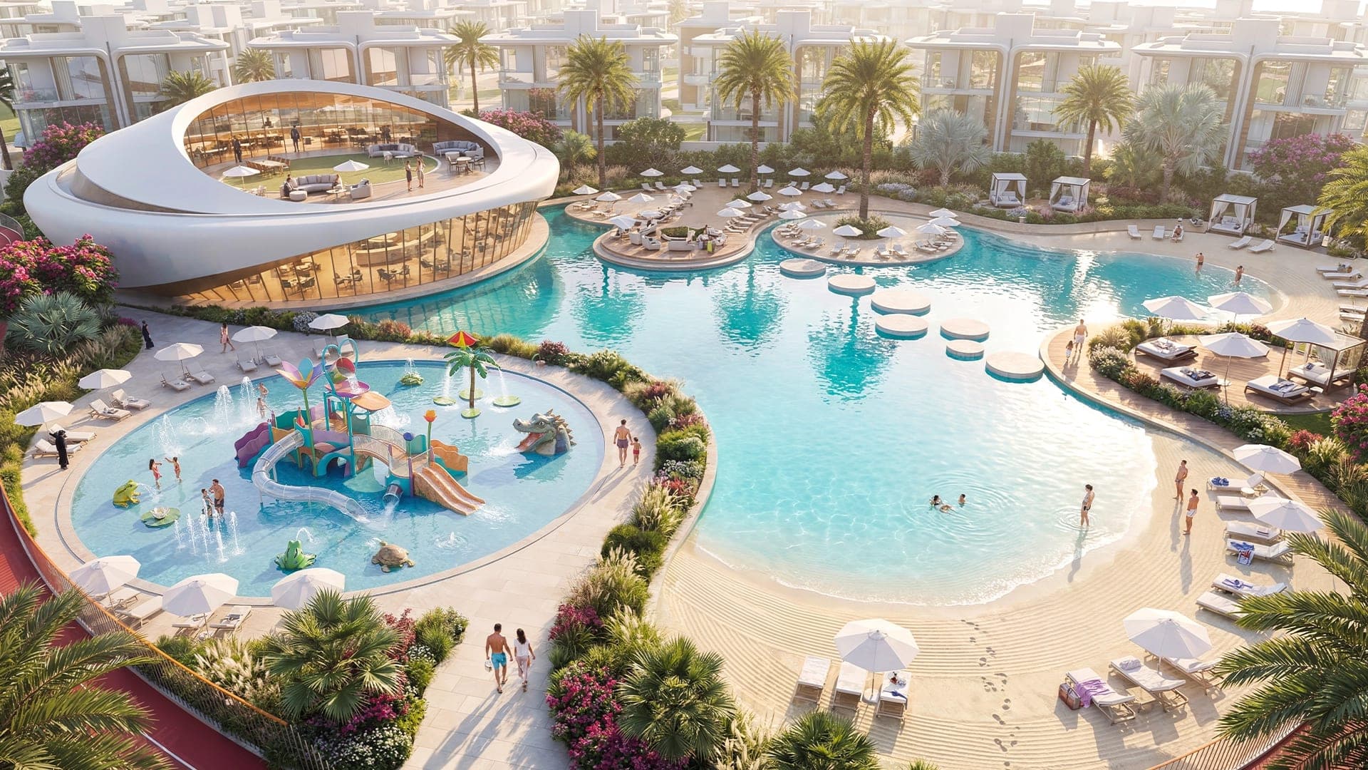 Render of the pool and sand beach at Greenz by Danube from above, with a children's splash pool, an oval clubhouse with a glazed ground floor and roof terrace, and rows of homes behind