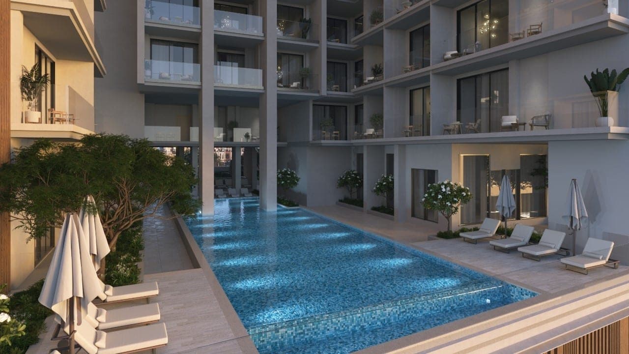 Render of the swimming pool and sun loungers in the podium courtyard at Nirvana Residences I
