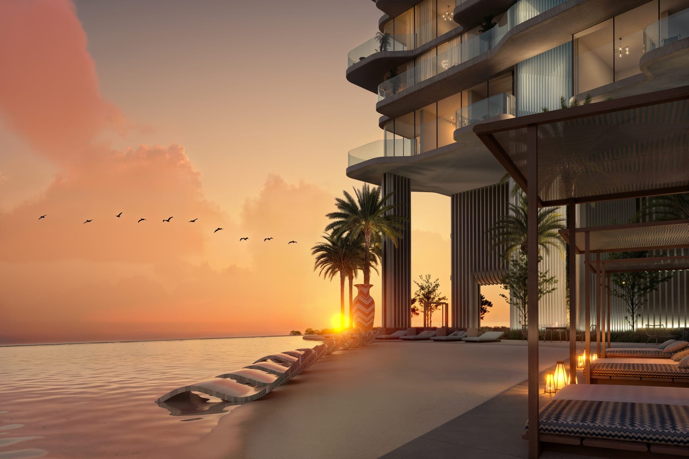 Render of the podium pool at OCTA Isle Interiors by Missoni at sunset, loungers set in the shallow water and cabanas beneath the tower