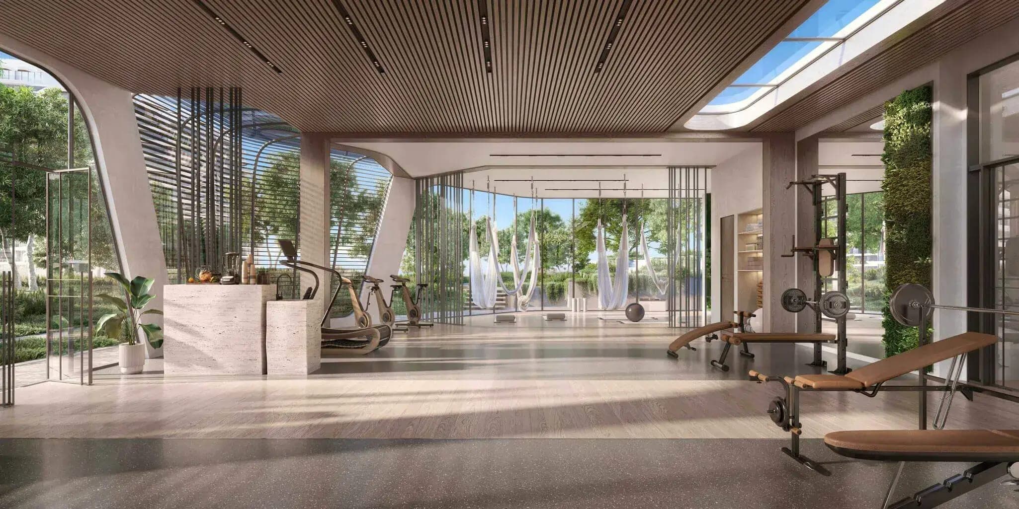 Render of the Wellness Pavilion at Passo by Beyond, a gym with a timber ceiling, aerial yoga hammocks and garden views