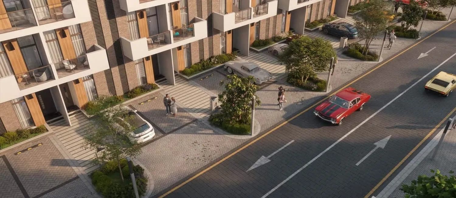 Render of a residential street at R. Hills, looking down over the parking bays and townhouse frontages