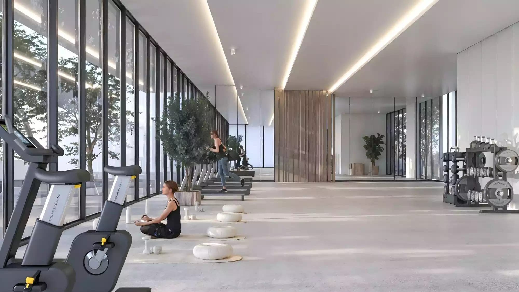 Render of the residents' gym at Sakura Gardens by HRE Development, with equipment set along a full-height glazed wall