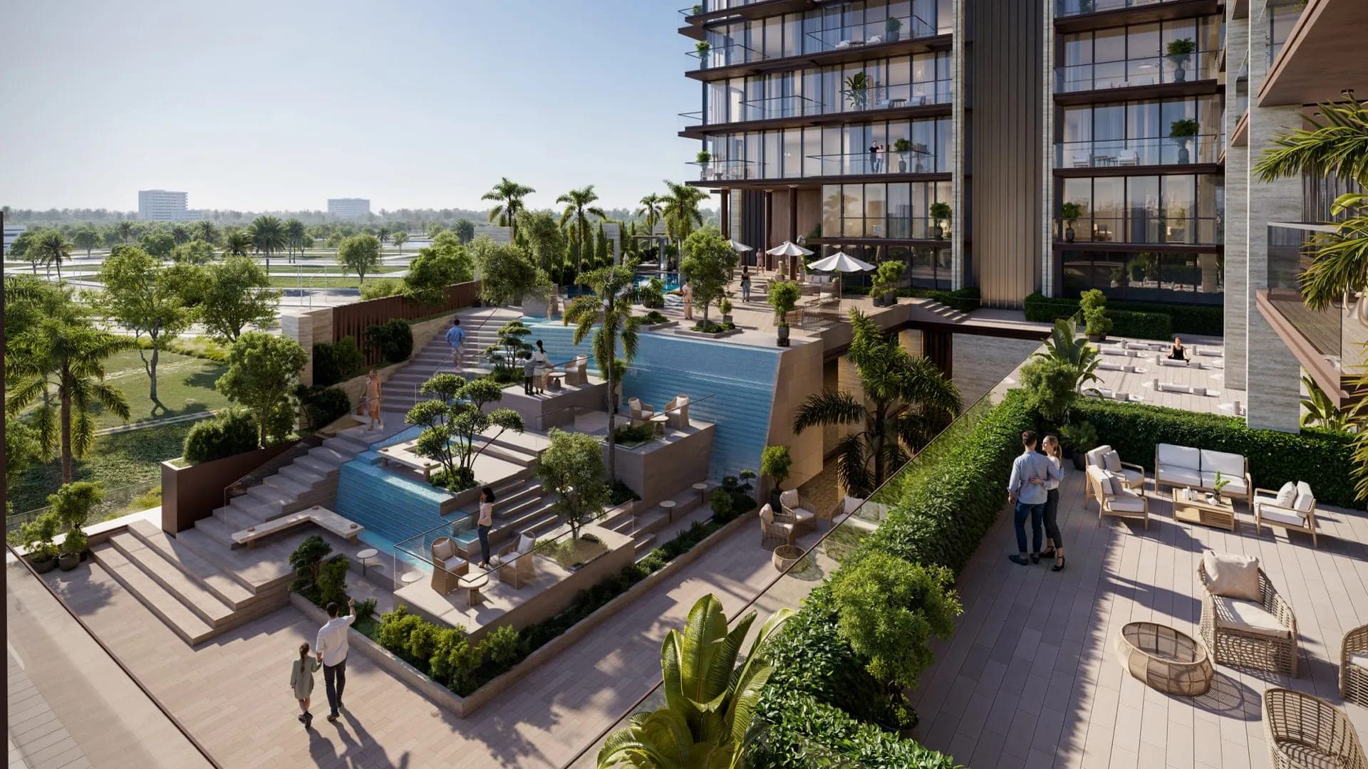Render of the podium at Sea Cliff by Imtiaz, with cascading pools, stepped seating and lounge terraces at the foot of the building