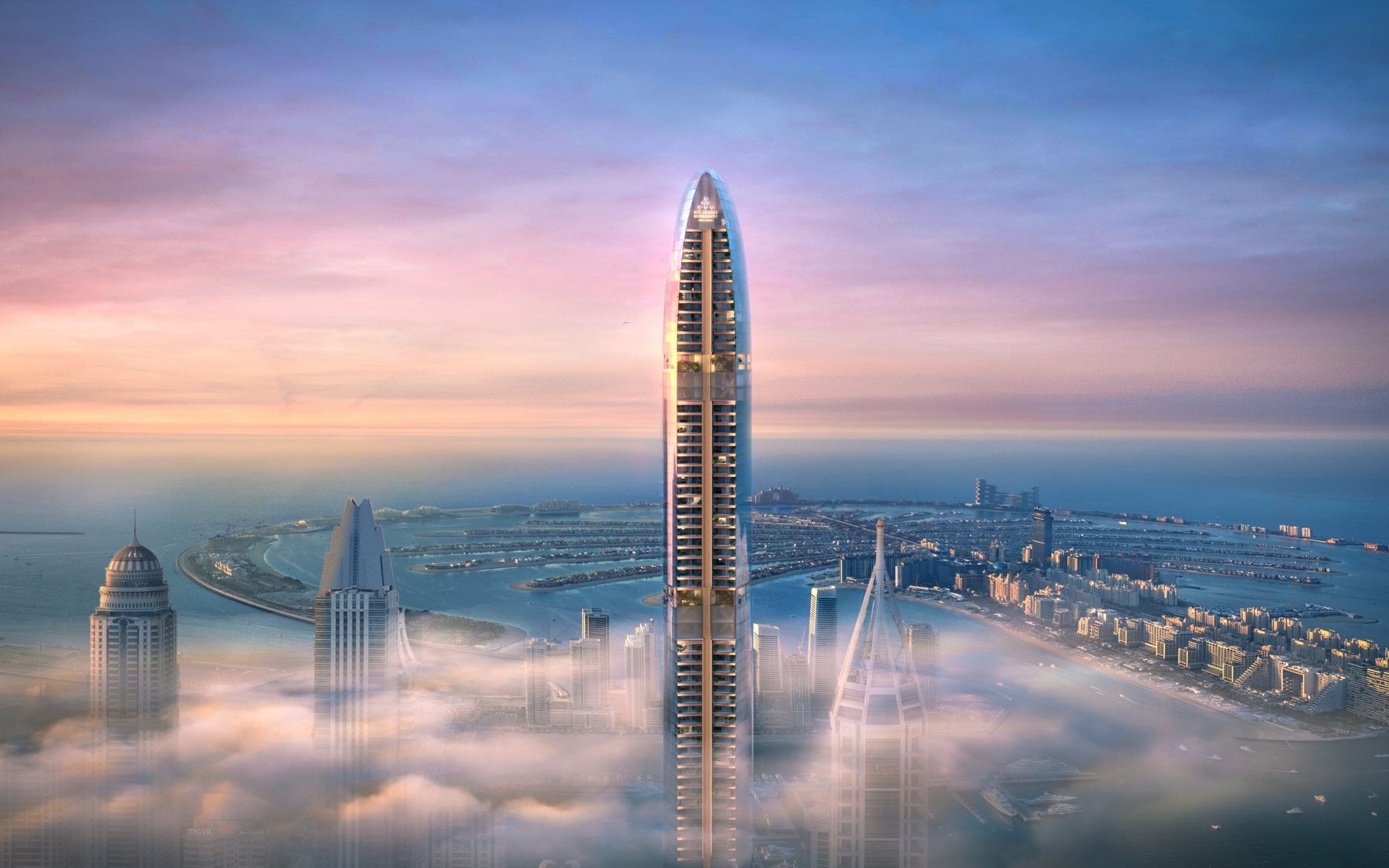 Render of the Six Senses Residences tower in Dubai Marina rising above morning fog, with Palm Jumeirah beyond