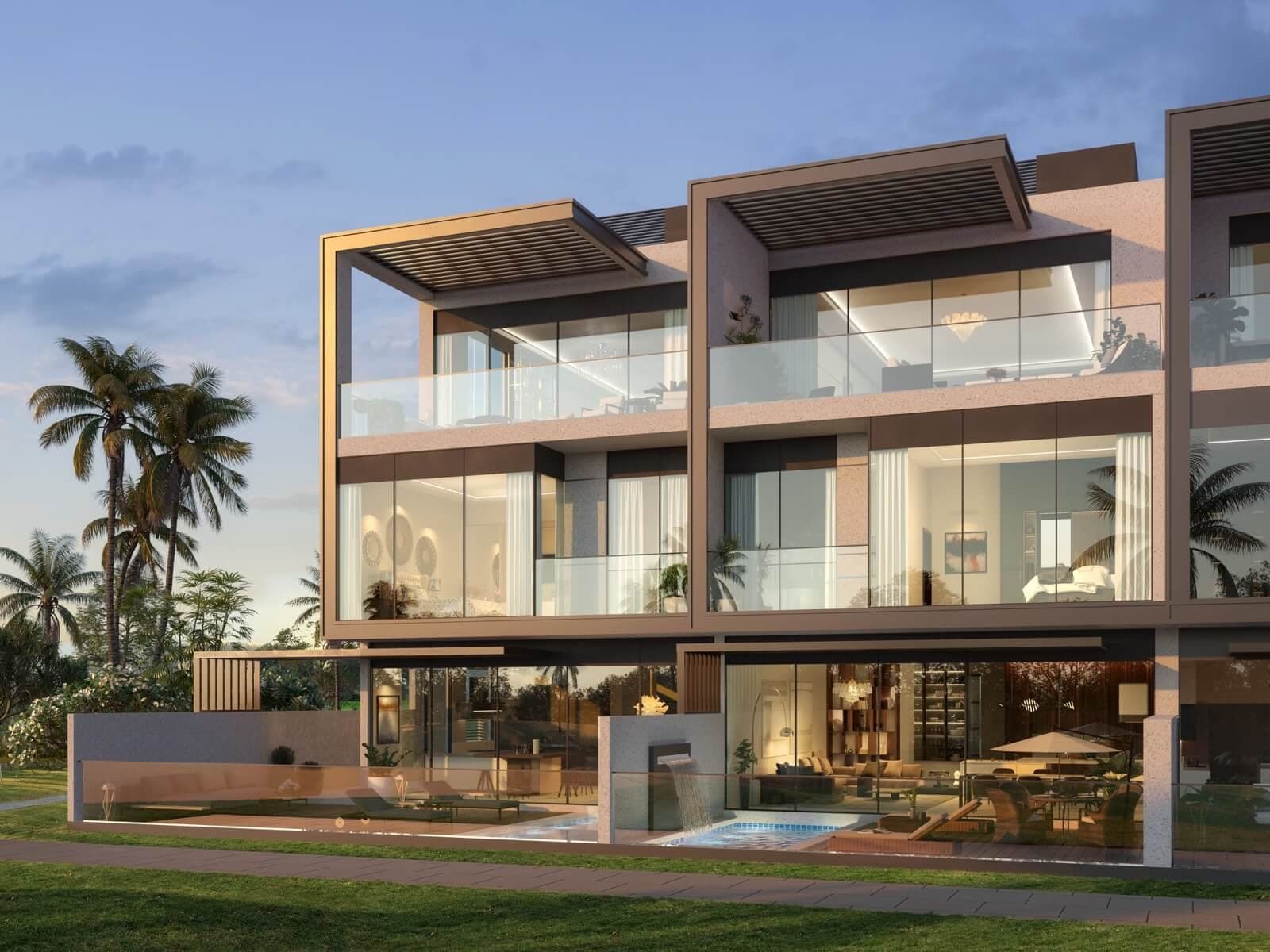 Render of a row of three-storey townhouses at Terra Golf Collection in Jumeirah Golf Estates, seen from the garden side with plunge pools and glazed terraces at golden hour