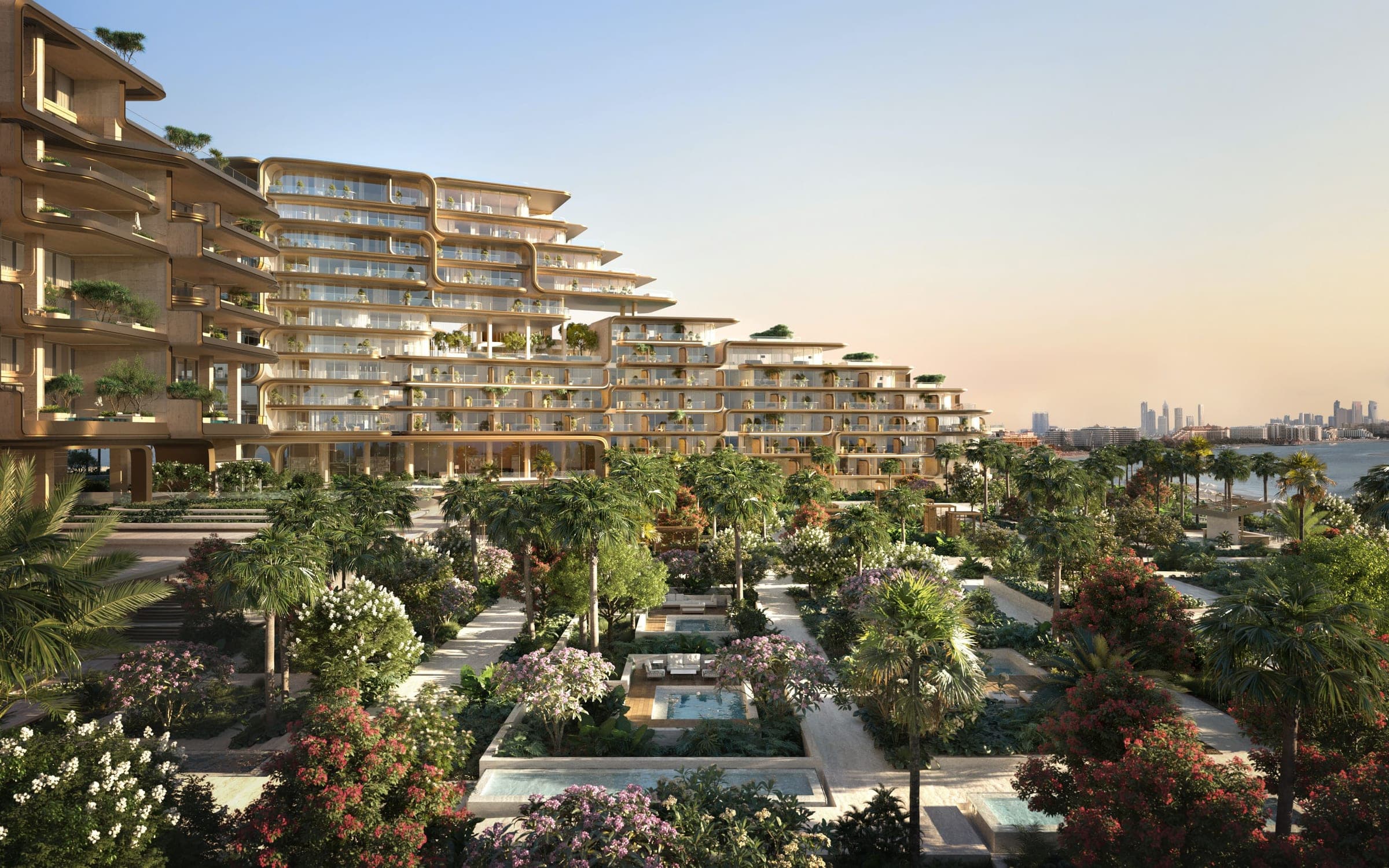 Render of the terraced facade of The Alba Resort Residences above planted gardens and water features, with the Dubai Marina skyline in the distance