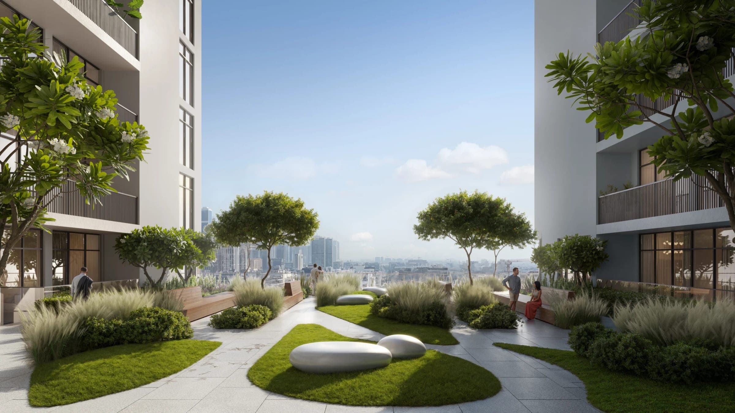 Render of the podium garden at VERDAN1A 4, with lawn mounds, grasses and paths between the building wings