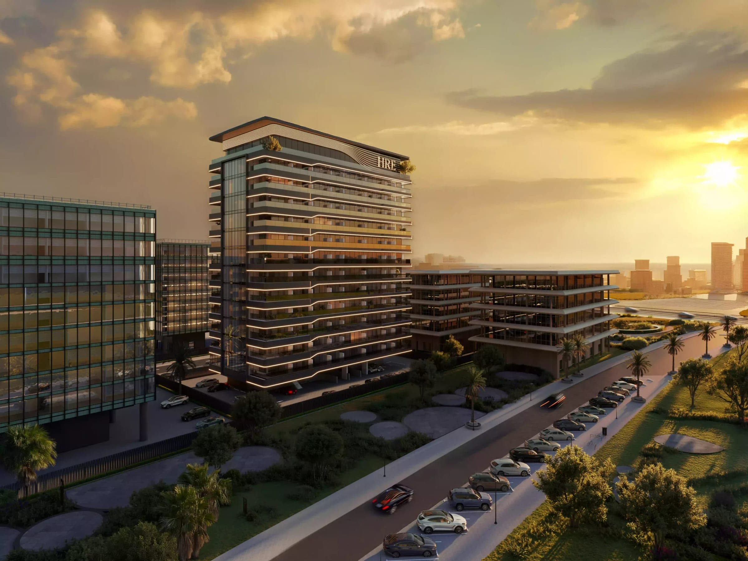 Render of Wadi Hills by HRE Development at sunset, seen across the surrounding low-rise blocks in Wadi Al Safa, Dubailand