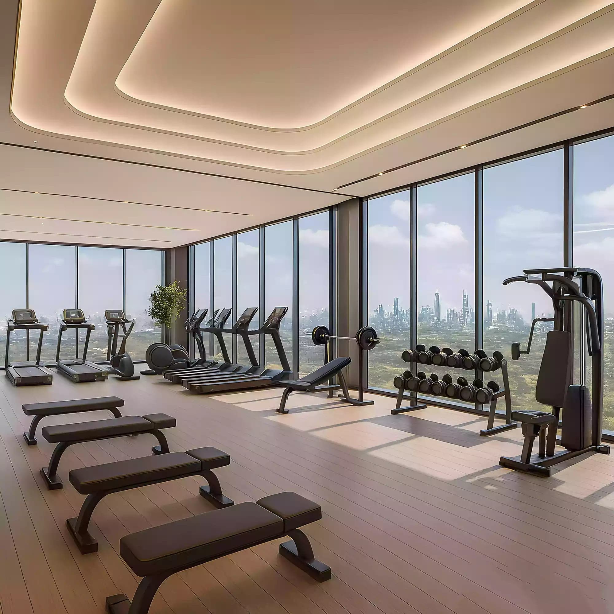 Render of the residents' gym at Wadi Hills by HRE Development, with cardio and weights equipment along a glazed wall