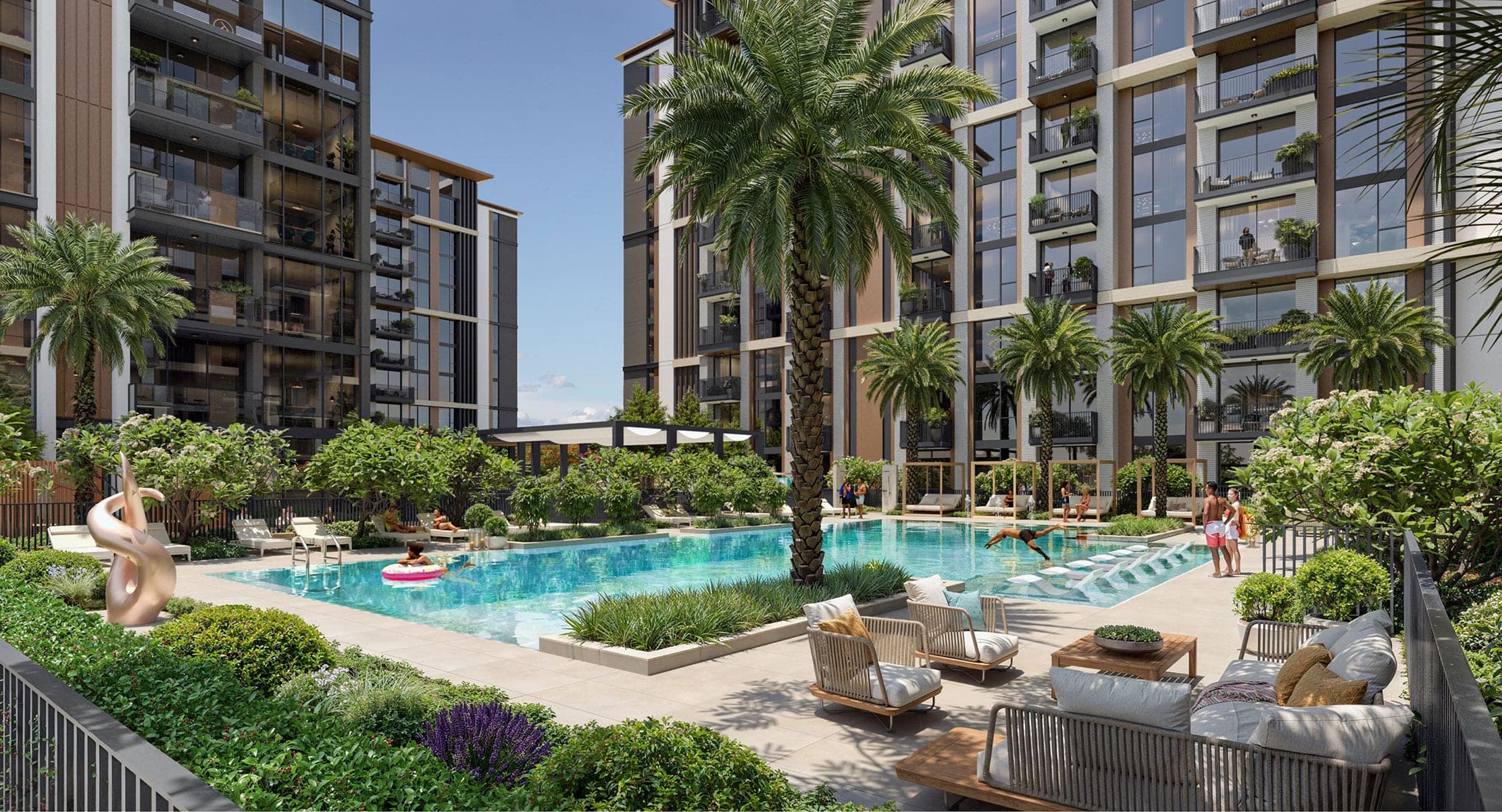 Render of the courtyard pool at Windsor House in Dubai South, with palms, sun loungers and residents swimming below the balconied blocks